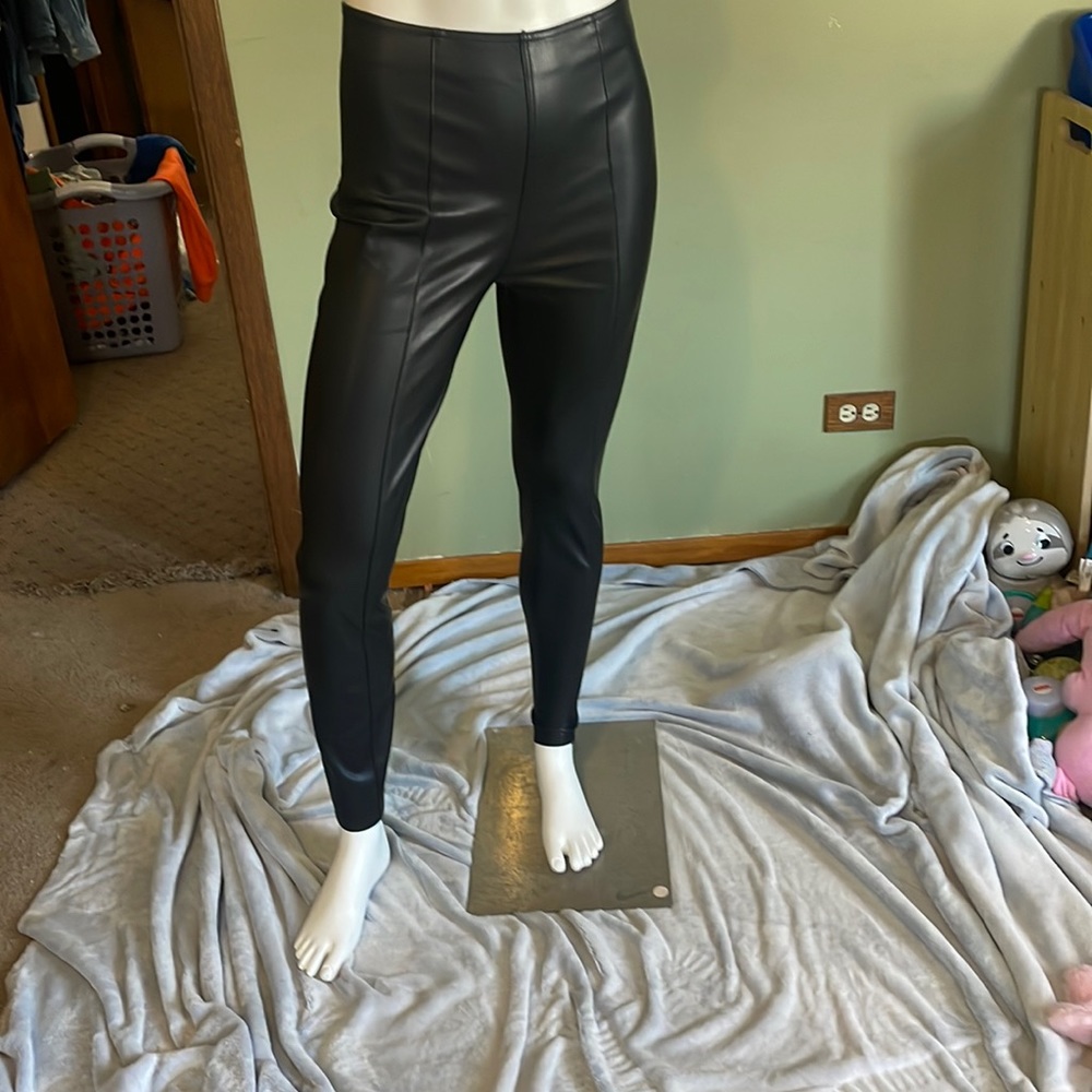 We the free faux leather pants, high rise and skinny leg. Size 27